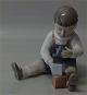 Dahl Jensen 1167 Boy with lego blocks 13.5 cm