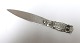 Silver letter 
knife (830). 
Owl with green 
eyes. Length 
11.5 cm. 
Produced 1925.