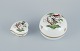 Herend, 
Hungary. Two 
porcelain 
lidded jars 
hand-painted 
with 
butterflies and 
birds on 
branches. ...