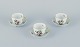 Herend, 
Hungary. Three 
porcelain 
coffee cups 
with saucers 
hand-painted 
with 
butterflies and 
...