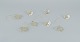 Royal 
Copenhagen 
"Royal 
Christmas". Set 
of eight brass 
Christmas 
ornaments for 
hanging on the 
...
