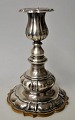 Silver 
candlestick, 
20th century 
Cohr, 
Fredericia, 
Denmark. Rococo 
style. On a 
bakelite base. 
...