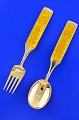 Anton Michelsen 
christmas 
cutlery, gilded 
sterling silver 
with an inlaid 
enamel motif. 
Christmas ...