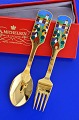 Anton Michelsen 
christmas 
cutlery, gilded 
sterlingsilver 
with an inlaid 
enamel motif. 
Christmas ...
