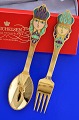 A. Michelsen 
Christmas 
cutlery, gilded 
sterling silver 
with enamel 
motif.  
Christmas fork 
and ...