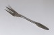 Kongelys. 
Silver plated. 
Cold cuts fork. 
Length 15.5 cm