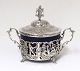 Sugar bowl with 
blue glass and 
silver mounting 
(800). Diameter 
9 cm.