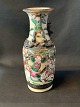 This beautiful 
Chinese vase is 
classic 
porcelain art 
at its best. 
The vase is 
tall and slim, 
...
