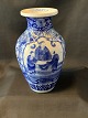 Chinese vase 
with blue 
painting in 
classic style. 
The vase is 
beautiful with 
its curved 
shapes, ...