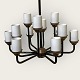 Modern chandelier, 12 light arms with 7 cm high opal glass shades. Diameter approx. 45 cm and ...