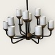 Modern 
chandelier, 12 
light arms with 
7 cm high opal 
glass shades. 
Diameter 
approx. 45 cm 
and ...