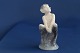 Royal 
Copenhagen 
figure, pan 
(faun) on tree 
stump.
Decoration 
number 1738.
1. ...