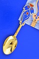 A. Michelsen 
Christmas 
cutlery, gilded 
sterlingsilver 
with an inlaid 
enamel motif.  
Christmas ...