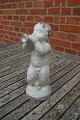 Danish ceramics 
& pottery by 
Michael 
Andersen, 
Bornholm, 
Denmark.
Naked boy with 
trumpet in a 
...