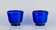 A pair of 
Danish art 
glass vases in 
dark blue 
glass. ...