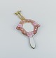 Murano, Italy. 
Hand mirror in 
art glass 
decorated with 
pink flowers.
Approximately 
from the ...