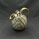 Height 14 cm.
"Diameter" 12 
cm.
Stamped with 
Michael 
Andersen's 
house mark, 
Rønne's city 
...