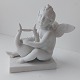 Figure I 
bisquit 
porcelain of 
lyre-playing 
putti. Made by 
Bertel 
Thorvaldsen 
(1770-1844). 
...