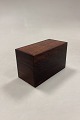 Playing card 
box made of 
Rosewood. 
Manufacturer 
unknown. 
Measures L: 
11.7 cm / 4.61 
in. W: 6 ...