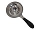Danish silver 
tea strainer 
with ebony 
handle from 
1928.
Hallmarked 
with Three 
Towers and ...