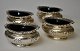 4 pcs. silver 
salt with blue 
glass insert, 
20th century 
England. L.: 
7.5 cm. H.: 3.5 
cm.
Price ...