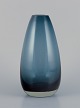 Tamara Aladin 
(1932-2019) for 
Riihimäen Lasi, 
Finland. Art 
glass vase in 
petroleum blue.
Model ...