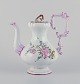 Emile Gallé (style of). Large coffee pot in faience with motifs of flowers and 
insects.