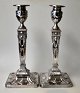 A pair of classic silver-plated English candlesticks, 19th/20th century. Silver-plated copper. ...