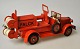 Tekno Falck fire engine, 20th century Denmark. Accompanied driver. L.: 18.5 cm. With defects.