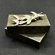 Length 6 cm.
Stamped EM for 
Erik Magnussen, 
Sterling, 
Copyright and 
Made in 
Denmark.
The ...