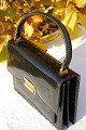 Handbag, for 
woman. W 23cm. 
H 18cm.