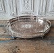 Oval silver plated tray with gallery edge, the tray stands on small "ball and claw feet" ...