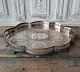 Oval silver plated tray with gallery edge, the tray stands on small "ball and claw feet" ...