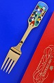 Anton Michelsen 
christmas 
cutlery, gilded 
sterlingsilver 
with an inlaid 
enamel motif. 
Christmas ...