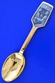 A. Michelsen 
Christmas spoon 
 gilded 
sterling silver 
with enamel 
motif.  
Christmas spoon 
from ...