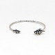 Georg Jensen; A 
Moonlight 
Grapes bangle 
in sterling 
silver.
Size M. dia. 
4,5-6 cm.
Stamped "GJ 
...