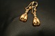 Nice earrings 
in 14 carat 
gold, with 
round shapes. 
The earring is 
constructed in 
two parts, so 
...