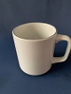Royal 
Copenhagen Blue 
edge, coffee 
mug.
Designed by 
Grethe Meyer in 
1965.
Decoration ...