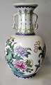 Chinese hand-painted porcelain vase, 20th century. Polychrome decorated with flowers and ...