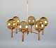 Sv. Mejlstrøm, 
Danish 
designer. Brass 
chandelier with 
six arms and 
dome-shaped 
shades made of 
...