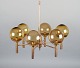 Sv. Mejlstrøm, Danish designer. Brass chandelier with six arms and dome-shaped shades made of ...
