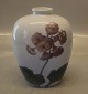 Royal 
Copenhagen  
727-134 d RC 
Art Nouveau 
vase with 
flowers 17 cm 
In mint and 
nice condition
