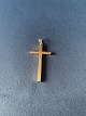 Nice little gold cross in 14 carat gold, for chain. The cross is a classic small gold cross that ...