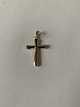 This small gold cross in 14 carat gold is ideal as a pendant for a thin gold chain. The gold ...