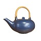 Eva 
Stæhr-Nielsen 
for Saxbo; A 
teapot 
decorated with 
a blue glaze. 
With handle in 
...