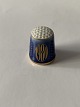 Bing & Grøndahl 
blue thimble 
from 1980.
Decoration 
number 9580.
1. sorting.
Height 2.7 ...