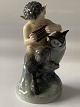 Beautiful 
little figure 
depicting Faun 
with owl. The 
figure is from 
Royal 
Copenhagen, 1st 
...