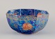 Rosenthal, Tyskland. Stor porcelænsskål i lustre-glasur. Hånddekoreret med 
frugtmotiver og bladdekoration i guld.