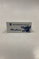 Royal 
Copenhagen Blue 
Flower Dealer 
Sign in English
Measures 14cm 
x 6,5cm ( 5.51 
inch x 2.56 ...