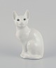 Royal Copenhagen. Porcelain figurine of a white Siamese cat.Model number 8/3281.Dating: ...